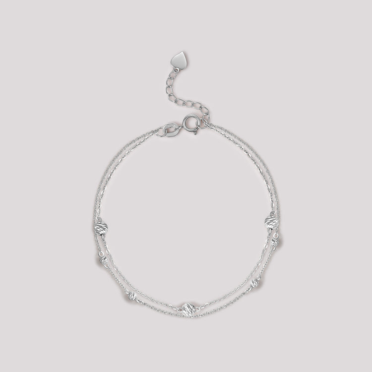 The Joy Bracelet crafted in solid 18k (750) white gold from the Cléamoi Joy Collection.