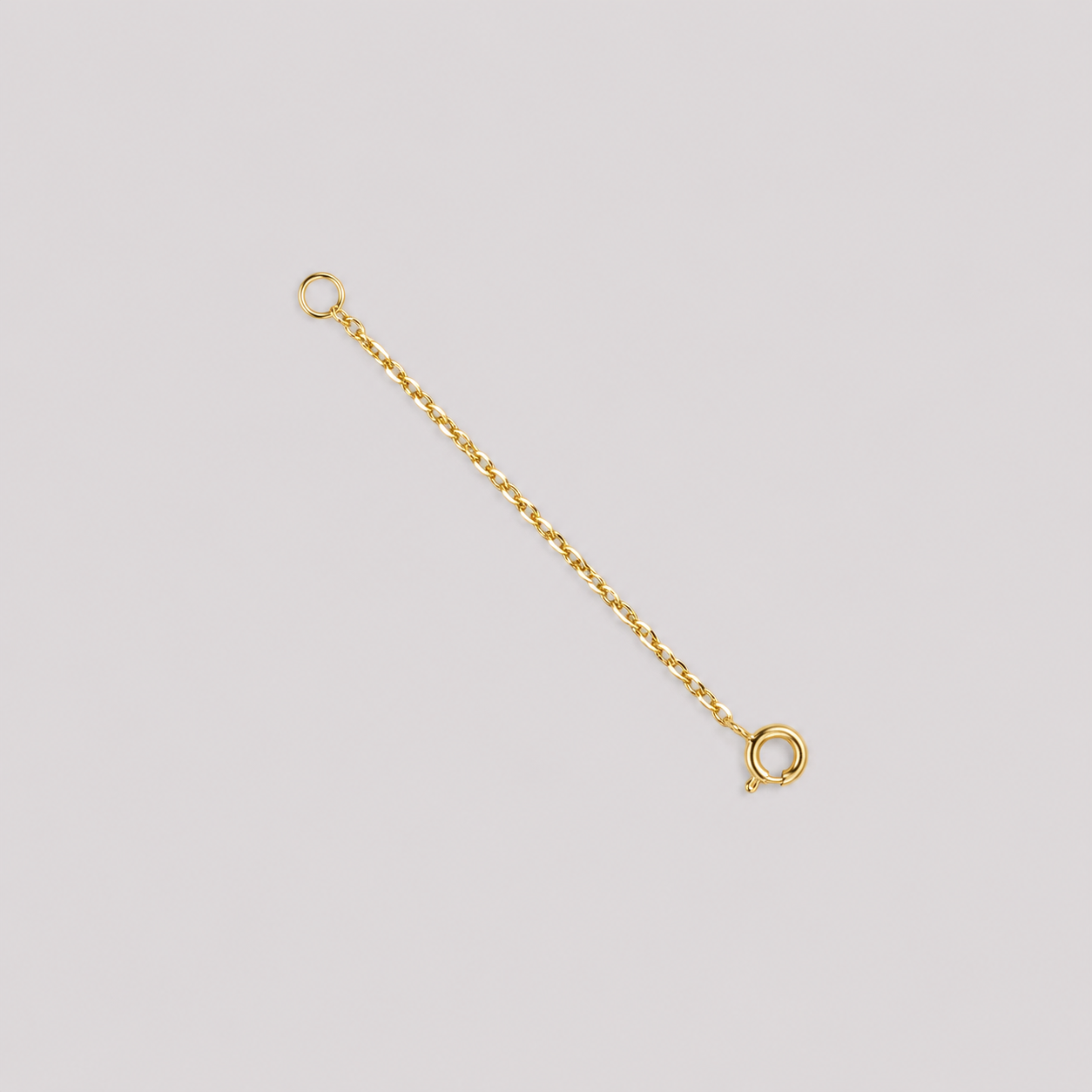 18K (750) yellow gold 4 cm extension chain for necklaces and bracelets with fine cable chain and spring ring clasp.