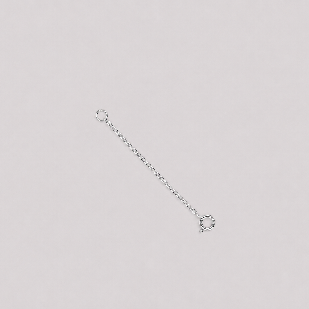 18K (750) white gold 4 cm extension chain for necklaces and bracelets with fine oval cable chain and spring ring clasp.