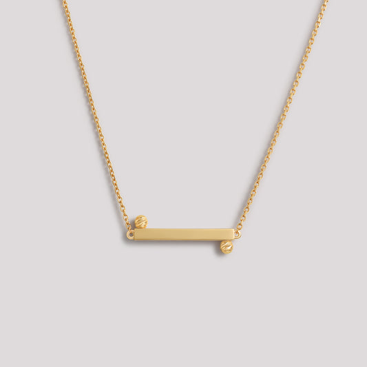 The Balance Necklace crafted in solid 18k (750) yellow gold from the Cléamoi Balance Collection.