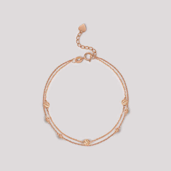 The Joy Bracelet crafted in solid 18k (750) rose gold from the Cléamoi Joy Collection.