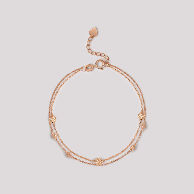 The Joy Bracelet crafted in solid 18k (750) rose gold from the Cléamoi Joy Collection.