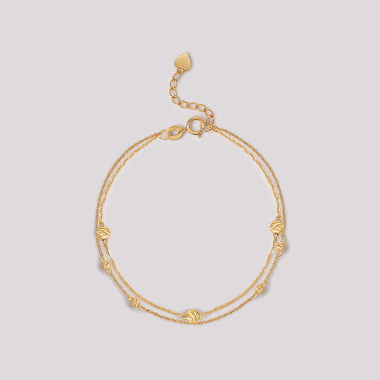 The Joy Bracelet crafted in solid 18k (750) yellow gold from the Cléamoi Joy Collection.